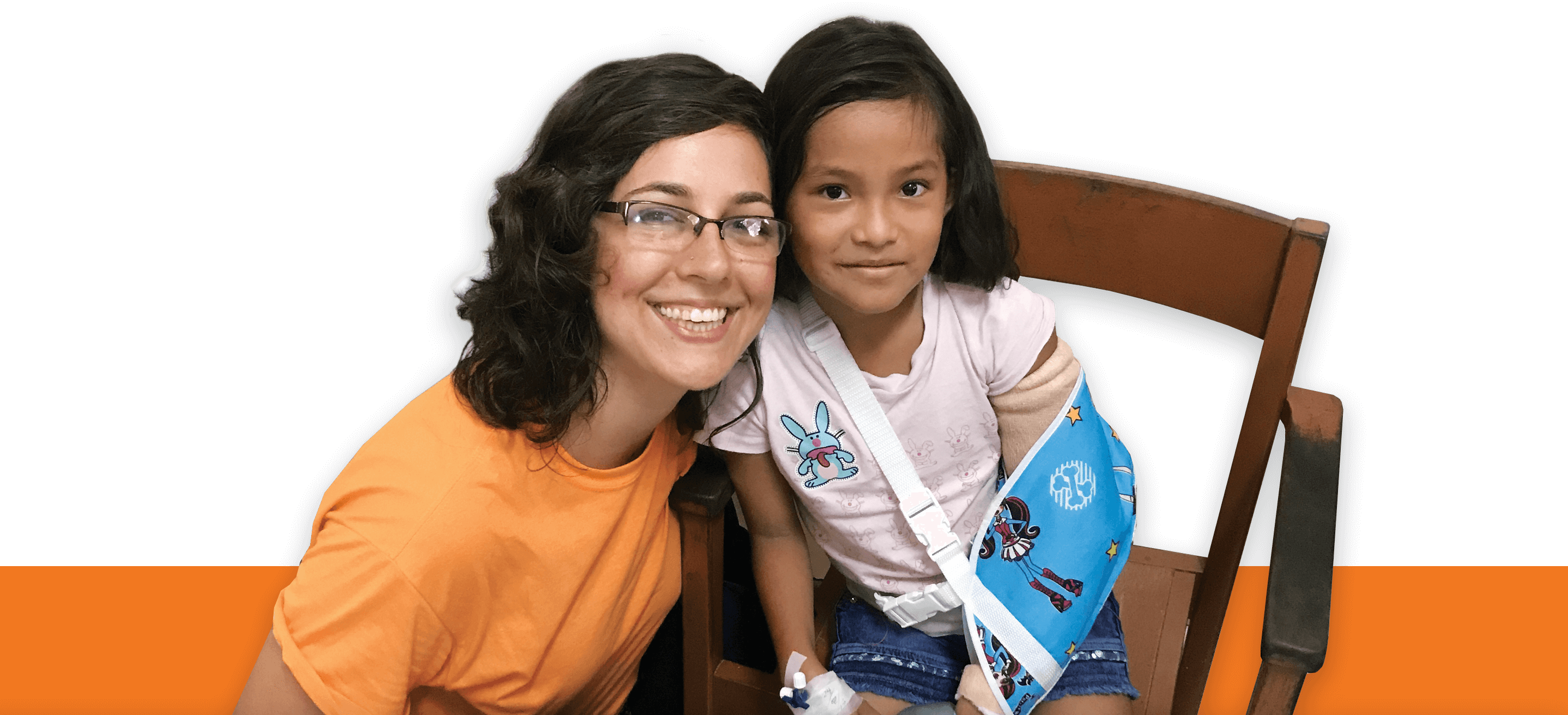 Scalpel At The Cross Member and a little girl with a cast on her arm taking a picture together