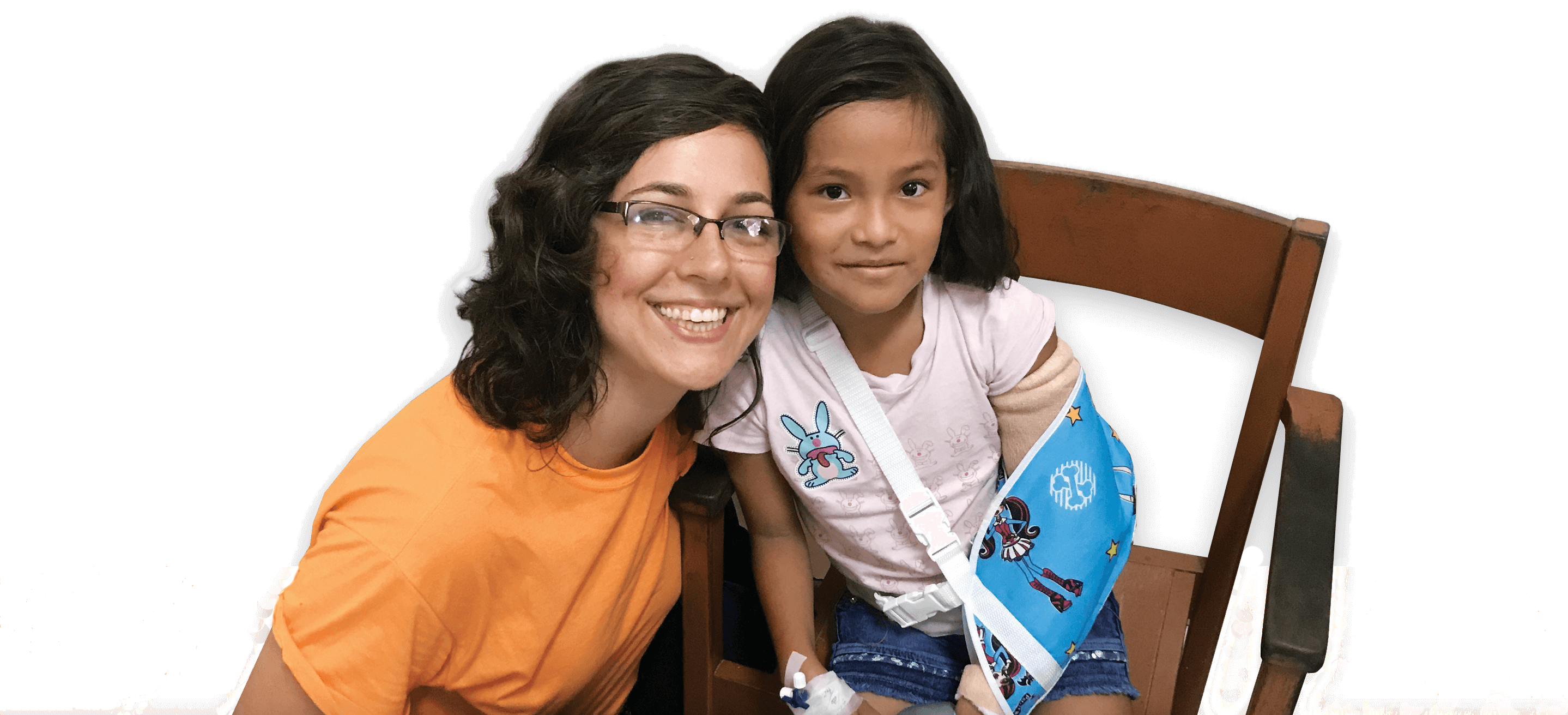 Scalpel At The Cross Member and a little girl with a cast on her arm taking a picture together